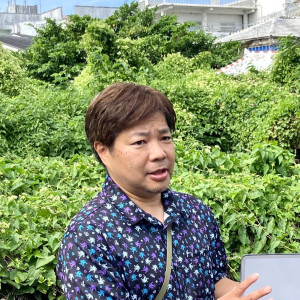 今回のツアーガイド：一般社団法人沖縄市観光物産振興協会 事務局長 金城 諭さん